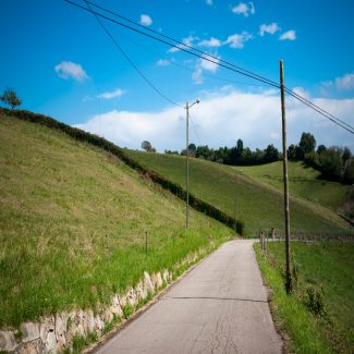 shutterstock_1820452385-resized Powerlines on a hill